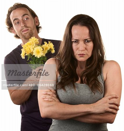 Angry young woman and man with flower bouquet
