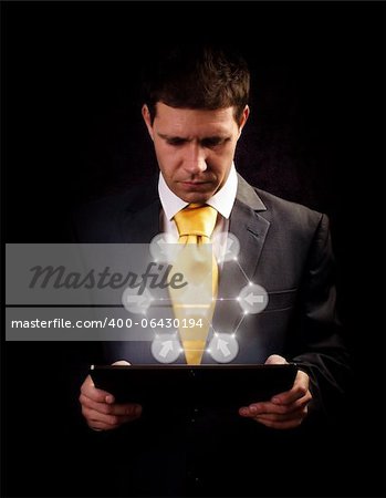 Business man working on digital tablet