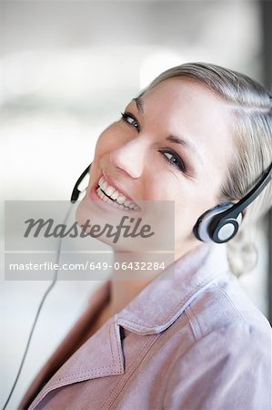 Businesswoman talking on headset