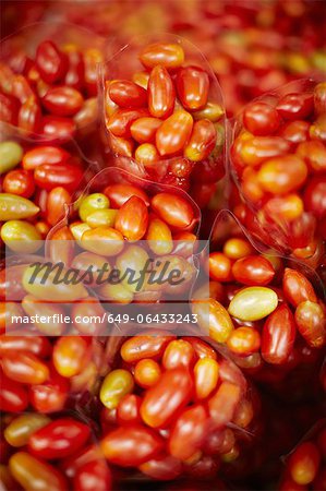 Bags of cherry tomatoes at market