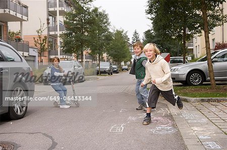 Children playing on suburban street