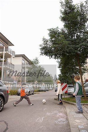 Children playing on suburban street