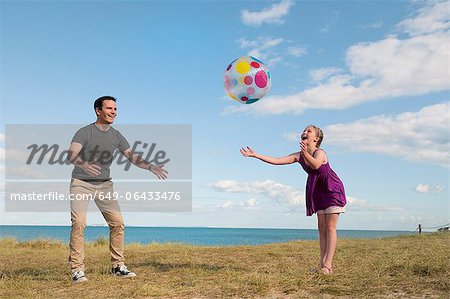 Father and daughter playing together