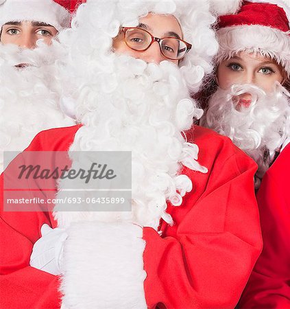 Portrait of people in Santa costume