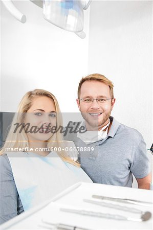 Portrait of Young Woman and Dentist at Dentist's Office, Germany