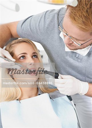 Young Woman and Dentist at Dentist's Office for Appointment, Germany