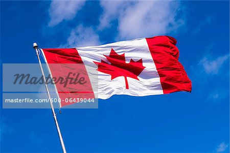 Canadian Flag Waving against Blue Sky, Halifax, Nova Scotia, Canada