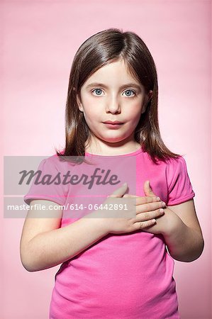 Girl with hands on heart Girl with hands on heart