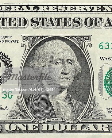 George Washington sur un dollar américain avec une expression triste