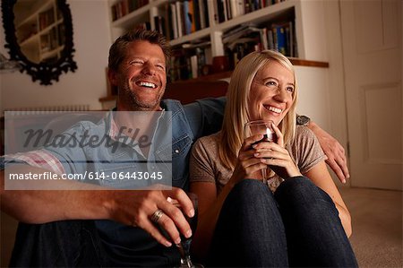 Couple drinking wine at home
