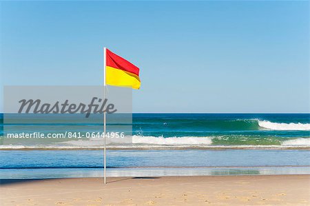 Swimming flag for satefy at Surfers Paradise beach, Gold Coast, Queensland, Australia, Pacific