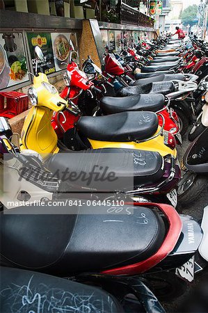 Hundreds of mopeds in a typical street scene in Ho Chi Minh City (Saigon), Vietnam, Indochina, Southeast Asia, Asia