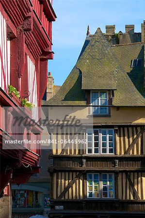 Medieval corbelled and half timbered mansions, in cobbled street, Old Town, Dinan, Brittany, Cotes d'Armor, France, Europe