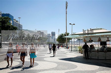 People walking on Copacabana beach promenade, Rio de Janeiro, Brazil, South America