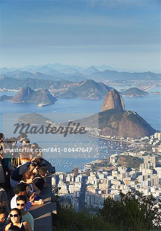 Tourists enjoying view of Sugar Loaf Mountain (Pao de Acucar) and Botafogo Bay from Corvocado, Rio de Janeiro, Brazil, South America