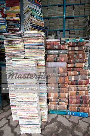 Piles of secondhand books for sale in College Street, famous for its book stalls, North Kolkata, West Bengal, India, Asia