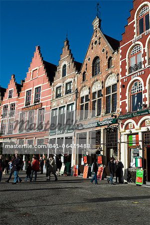 Gabled fronted restaurants in the Market Square at Christmas, Bruges, West Vlaanderen (Flanders), Belgium, Europe