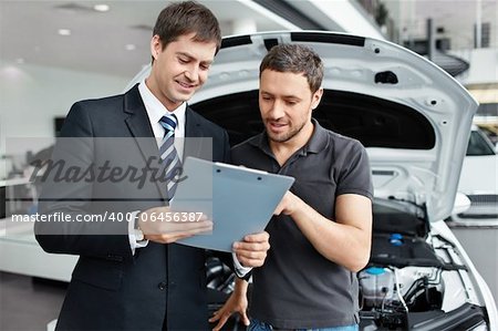 Young man buys a car