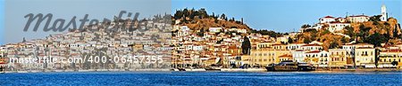 Poros Island, Saronic gulf, Greece, harbour, view from the sea.  Poros is a volcanic Island formed through the union of two smaller islands, Kalourla and Sphaeria. The island is located between the Saronic Greece islands of Methana and Hydra.