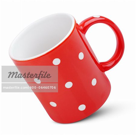 Red polka dot mug isolated on white background