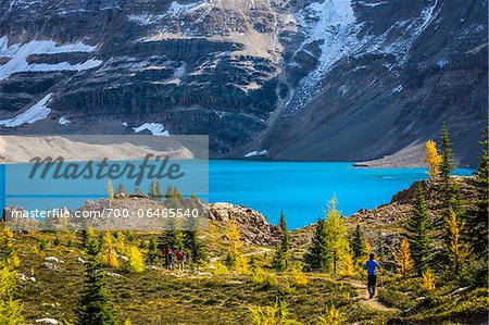 Hikers on Trail at McArthur Lake in Autumn, Yoho National Park, British Columbia, Canada
