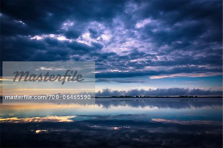 Storm Clouds over Still Lake Water, King Bay, Point Au Fer, Champlain, New York State, USA