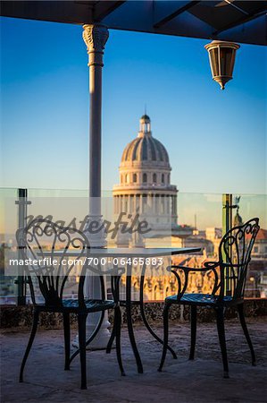 Bistro Table and Chairs on Rooptop of Hotel Parque Central with El Capitolio, Old Havana, Havana, Cuba Bistro Table and Chairs on Rooptop of Hotel Parque Central with El Capitolio, Old Havana, Havana, Cuba