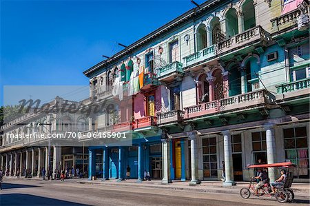 Brightly-Colored Buildings and Bicycle Transportation, Havana, Cuba Brightly-Colored Buildings and Bicycle Transportation, Havana, Cuba