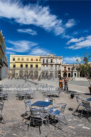 Restaurant Tables and Chairs in Plaza Vieja, Havana, Cuba Restaurant Tables and Chairs in Plaza Vieja, Havana, Cuba