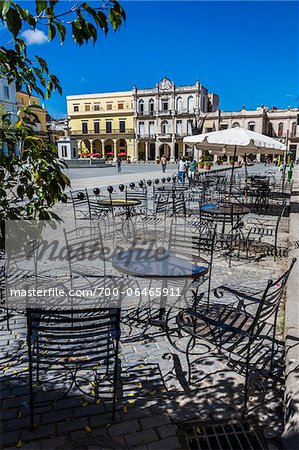 Restaurant Tables and Chairs on Patio Facing Plaza Vieja, Havana, Cuba