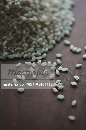 Brown rice on a wooden table