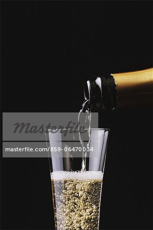 Pouring Champagne in a glass