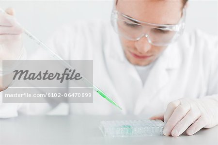 Male scientist in laboratory Male scientist in laboratory