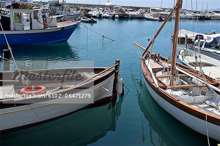 Boats moored at marina