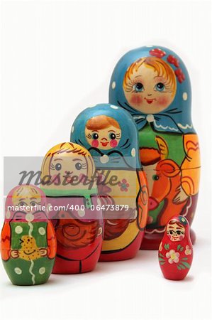 colored matryoshka dolls isolated on white background