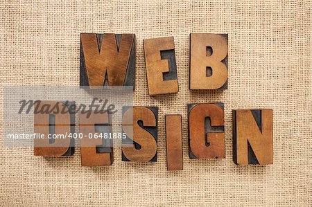 web design - text in vintage letterpress metal type blocks on burlap canvas