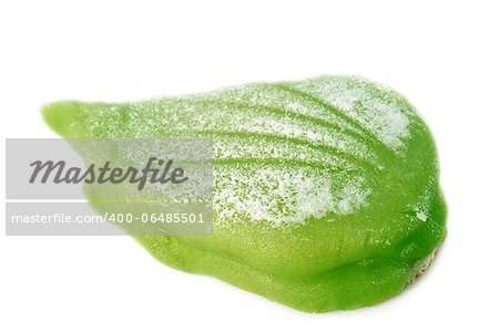 almond paste cake in front of white background