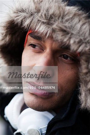 Portrait of Man Outdoors with Headphones on his Neck, Mannheim, Baden-Wurttemberg, Germany