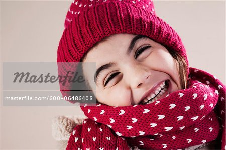 Portrait of Girl wearing Hat and Scarf in Studio