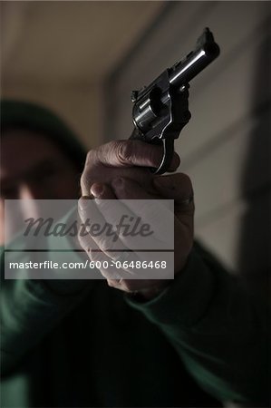 Close-up of Man Aiming Gun, Mannheim, Baden-Wurttemberg, Germany