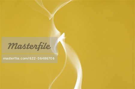 White smoke on yellow background