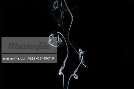 White smoke on black background
