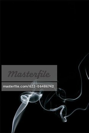 White smoke on black background