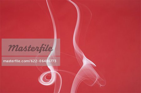 White smoke on red background