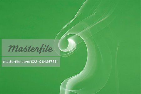 White smoke on green background