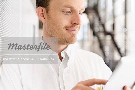 Doctor using tablet computer