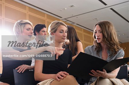 Businesswomen talking in office