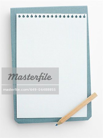Notepad paper with pencil