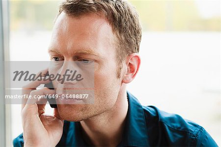 Businessman talking on cell phone