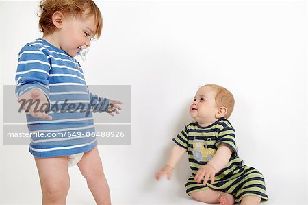 Toddler boys playing together